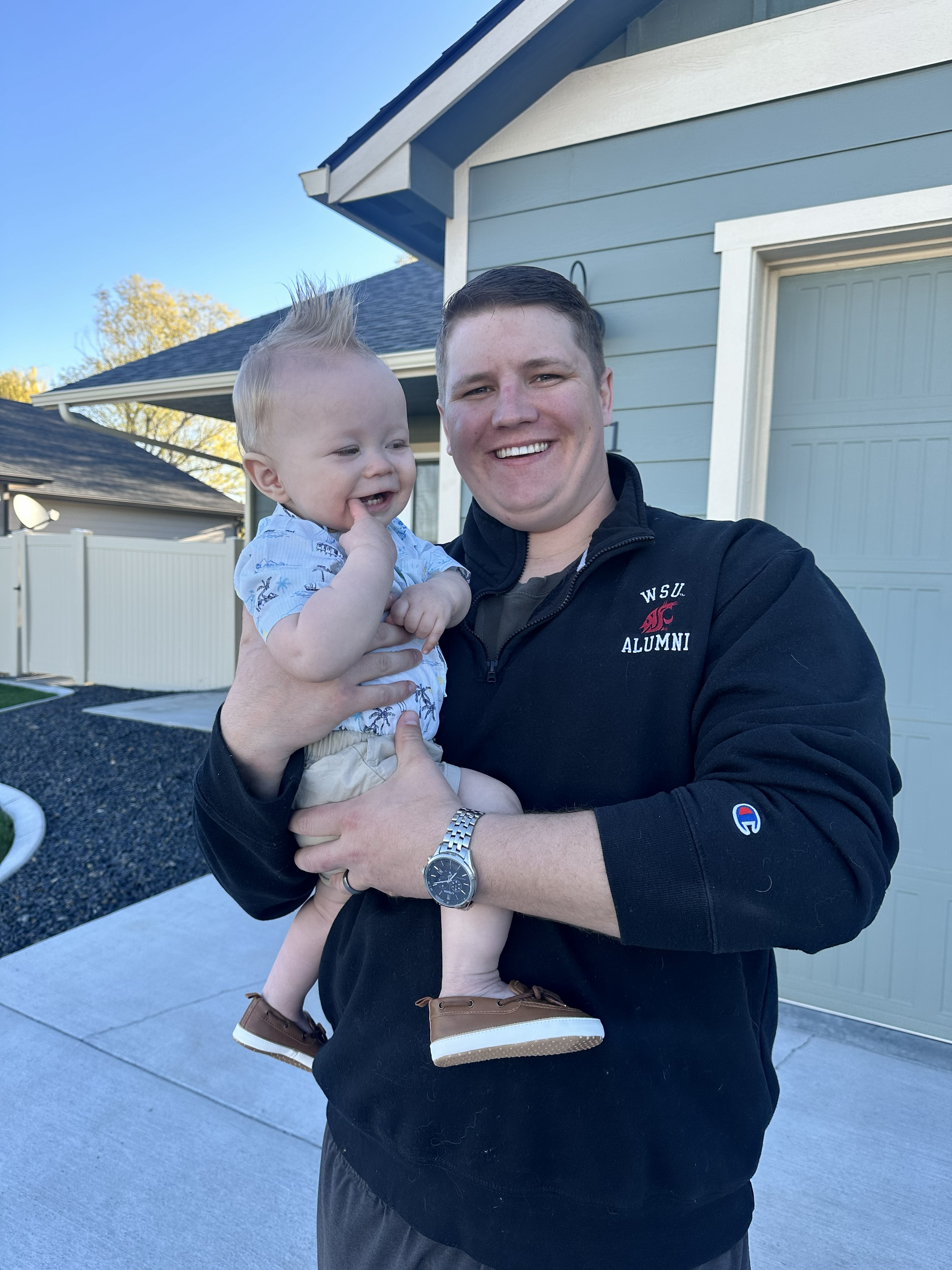 Jason Newton and son smiling