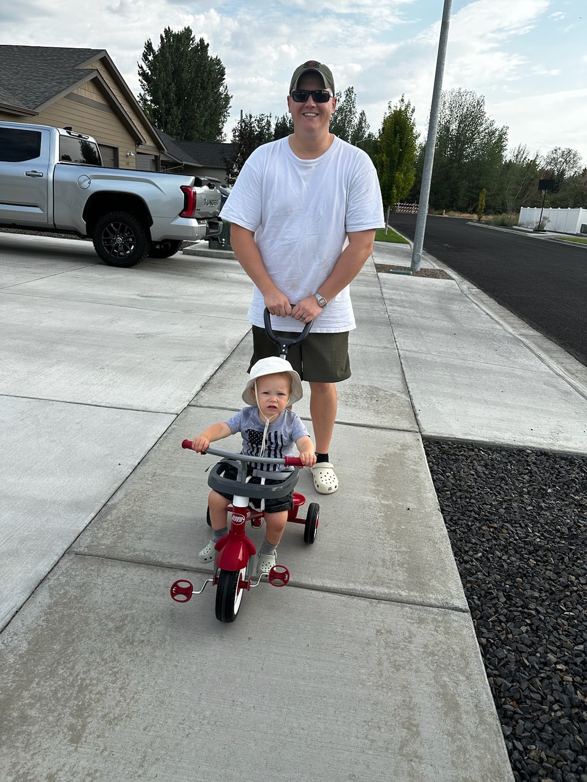Jason Newton walking with his son in Moses Lake, Washington