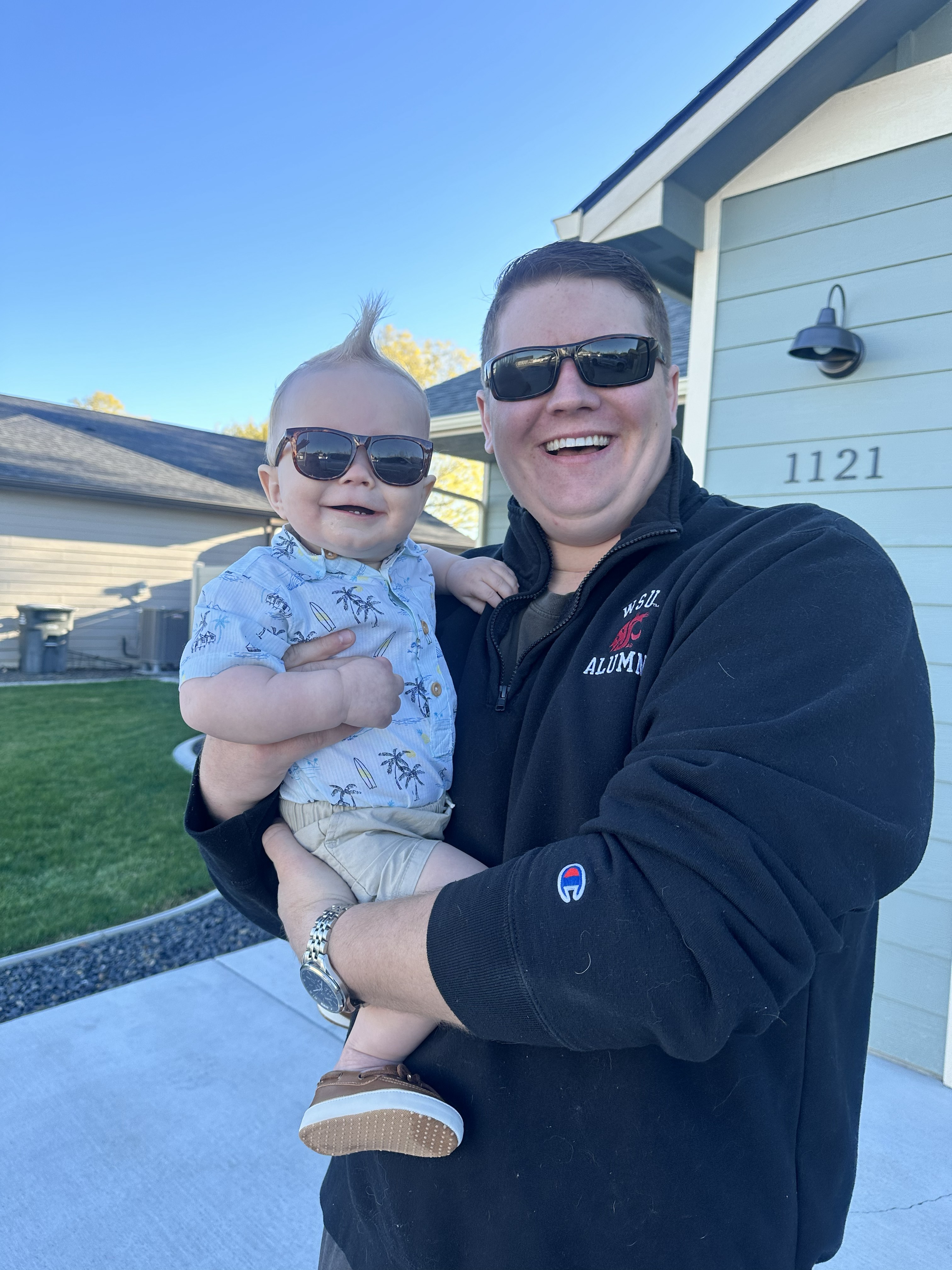 Jason David Newton with his son wearing sunglasses in Moses Lake, Washington