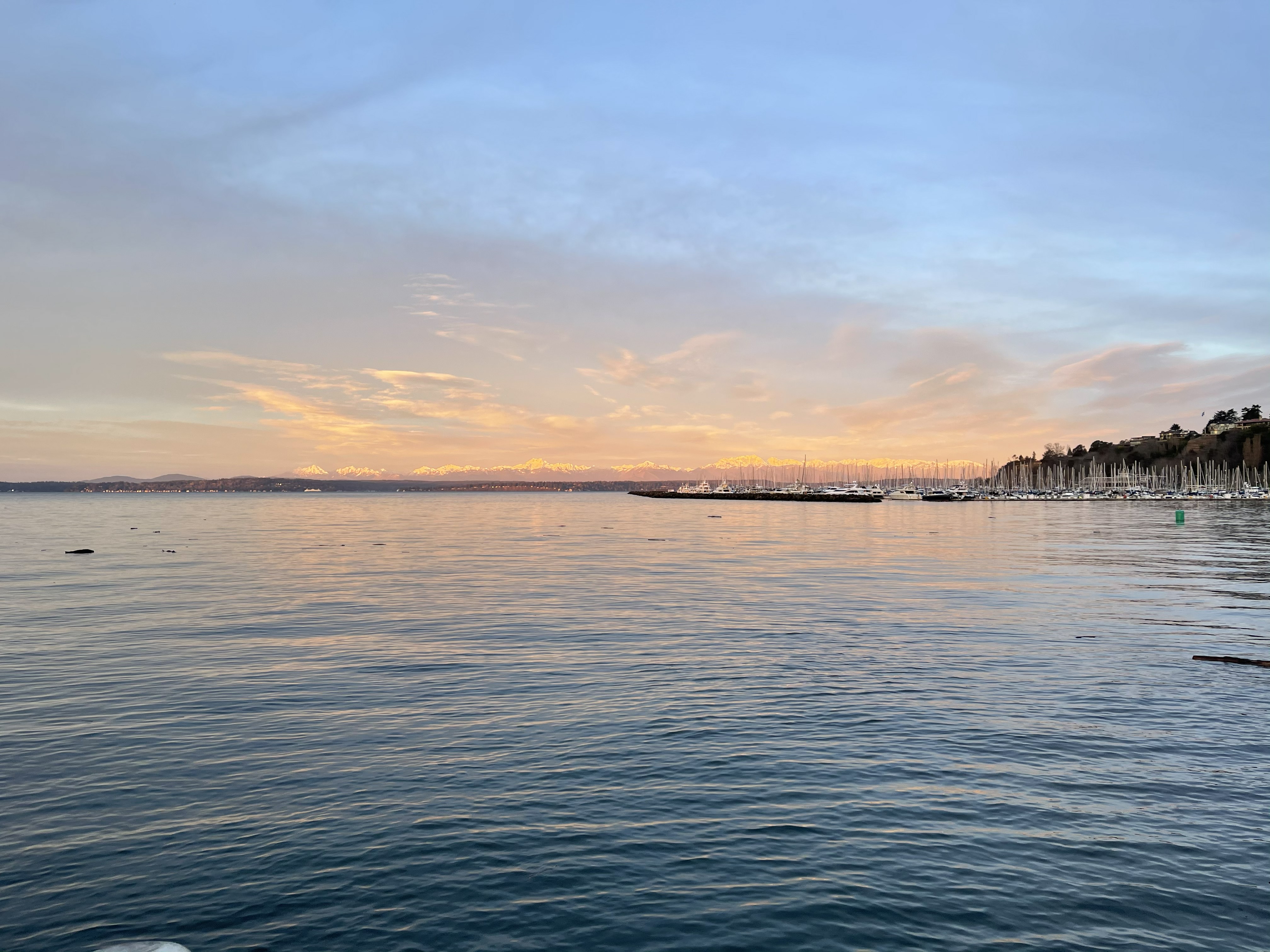Seattle sunset over ocean in the Pacific Northwest by Jason David Newton