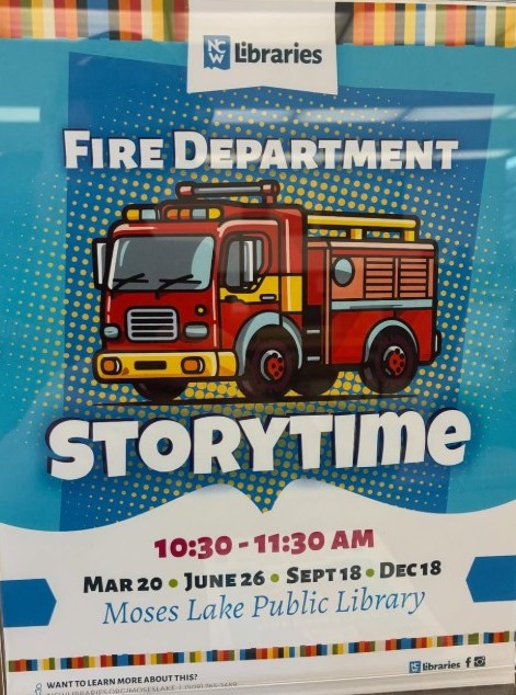 Ryker at Moses Lake Public Library Fire Department Story Time with junior firefighter badge